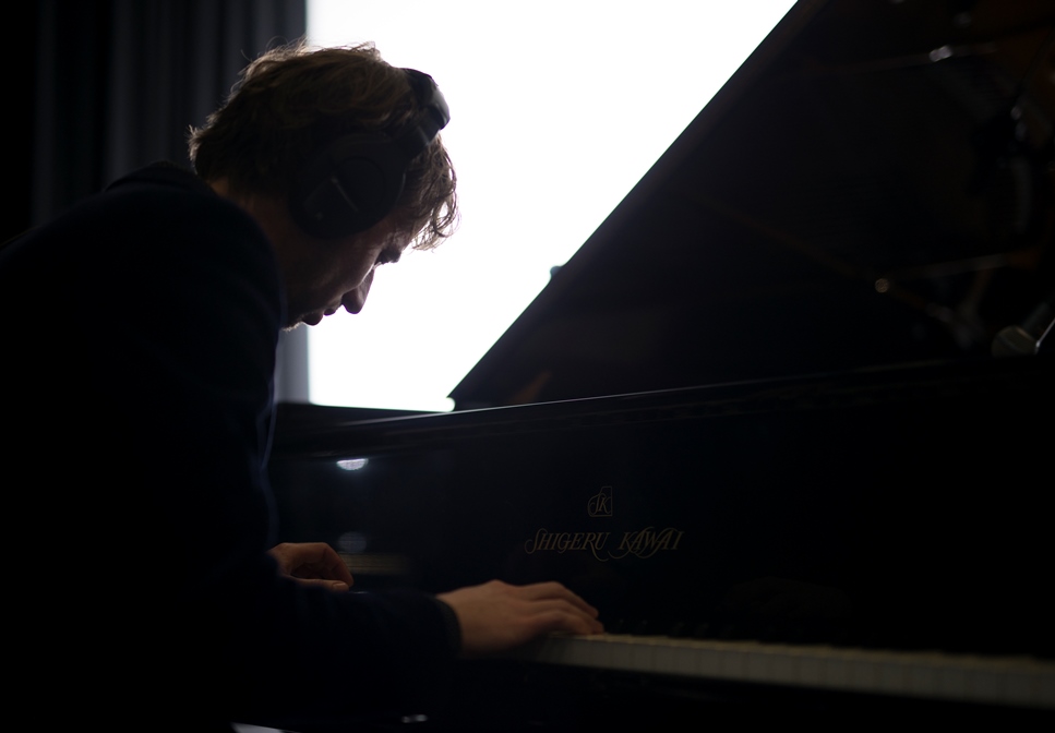 Photo of Sean Foran playing the piano